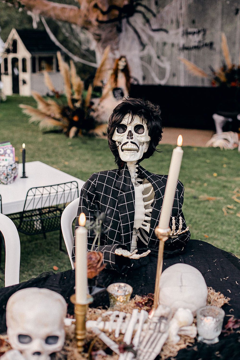 Spooky skeleton themed backyard Halloween party